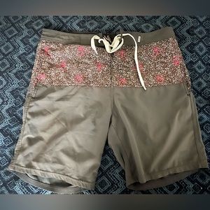 Catch Surf board shorts with pink palm tree accents